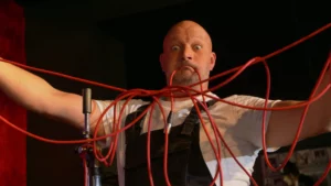 Philibert le magicien empêtré dans une corde rouge