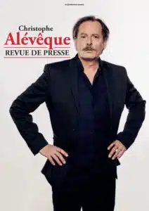 Affiche pour Christophe Alévêque, une photo de lui main sur les hanches en costume noir