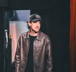 Phot de Tom Baldetti debout avec casquette
